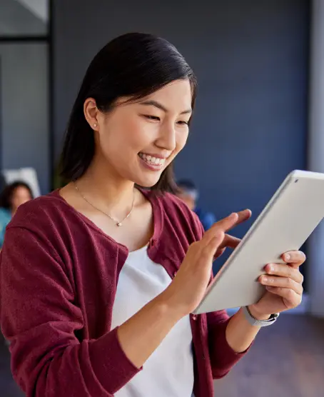 MigiHub interpreter sign language management software a woman holding a tablet