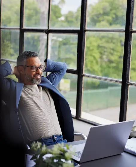 MigiHub interpreter sign language management software a man sitting in a chair with his hands behind his head