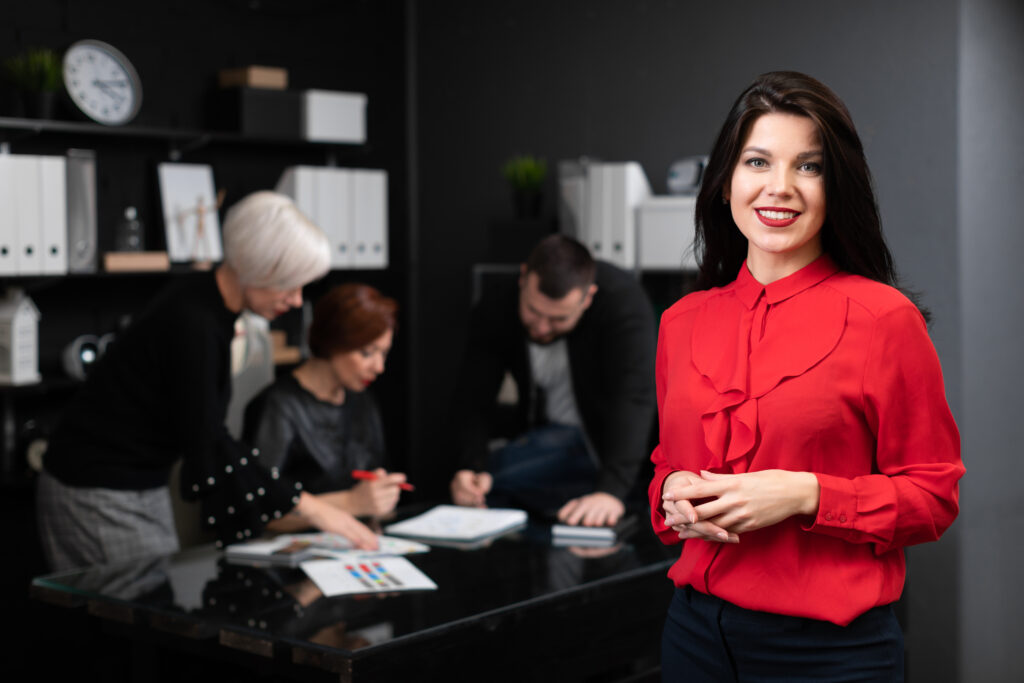a woman in a red blouse