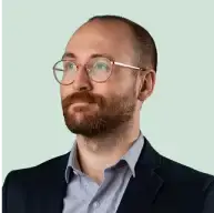 MigiHub interpreter sign language management, a man in a suit