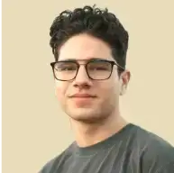 MigiHub interpreter sign language management, a man wearing glasses and a grey shirt
