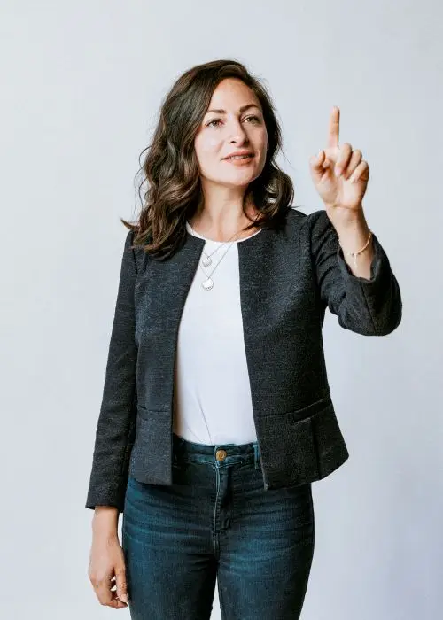 MigiHub interpreter sign language management, a woman pointing up with her finger
